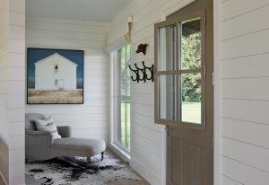 Whitewashed wood plank walls help to create peaceful and bright living spaces.